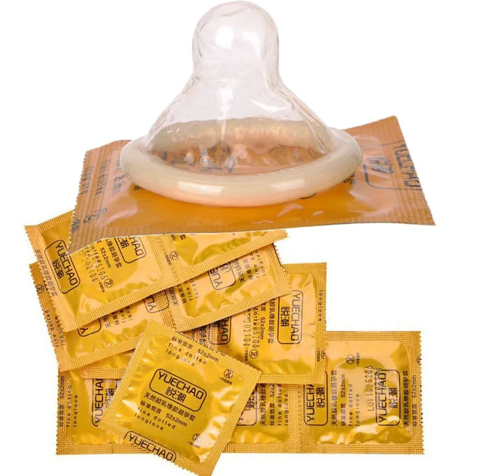 Wrap cock under condom