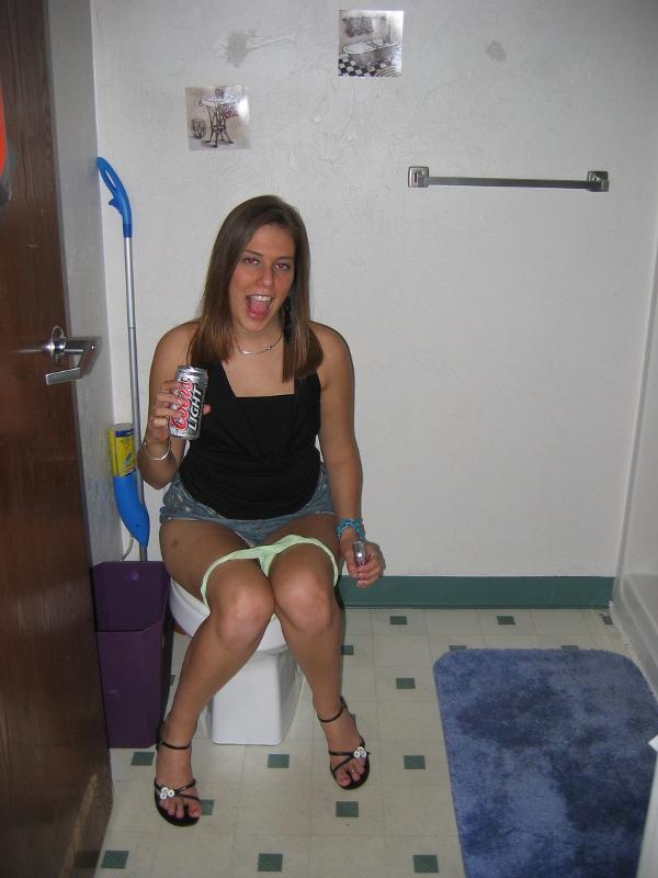 Girl on toilet panties down pussy