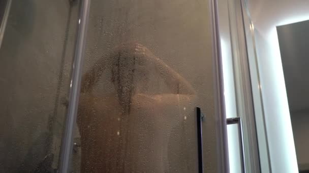 Nude woman glass house