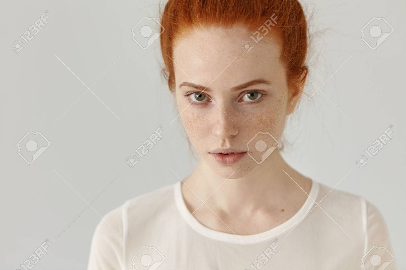 Redhead teen posing at home