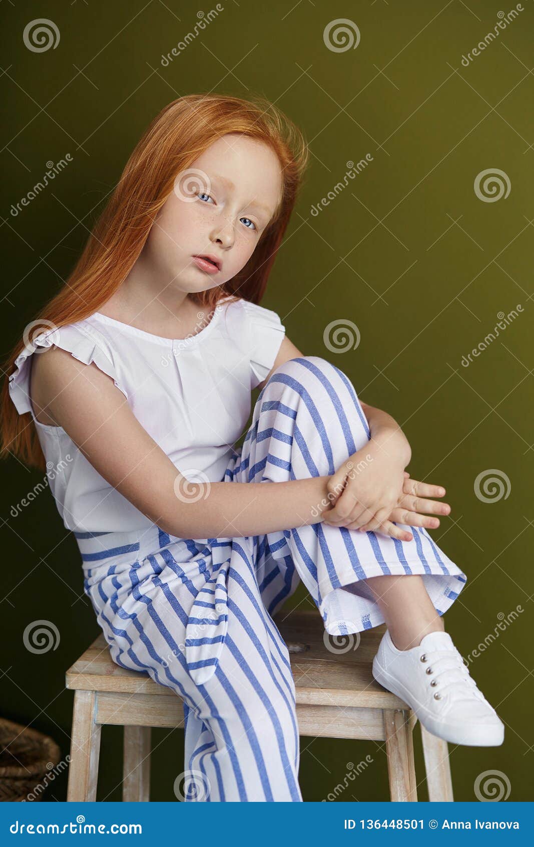 Redhead teen posing at home