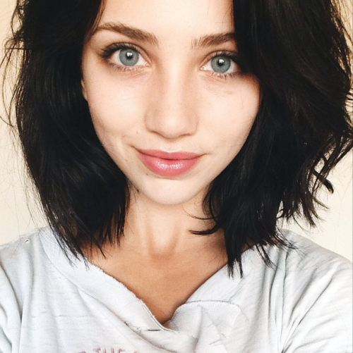 Beautiful girl with black hair green eyes