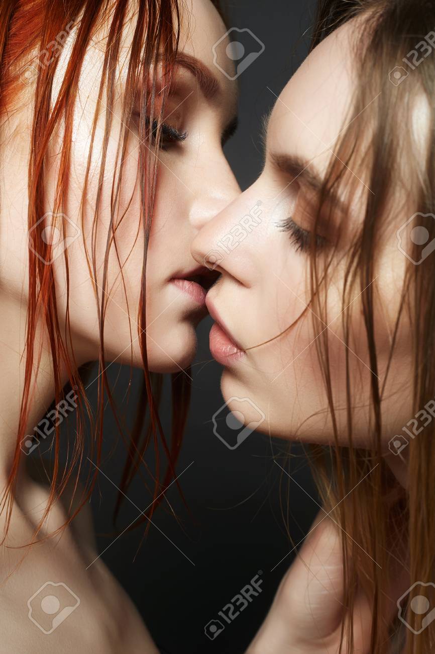 Two girls kissing and making out