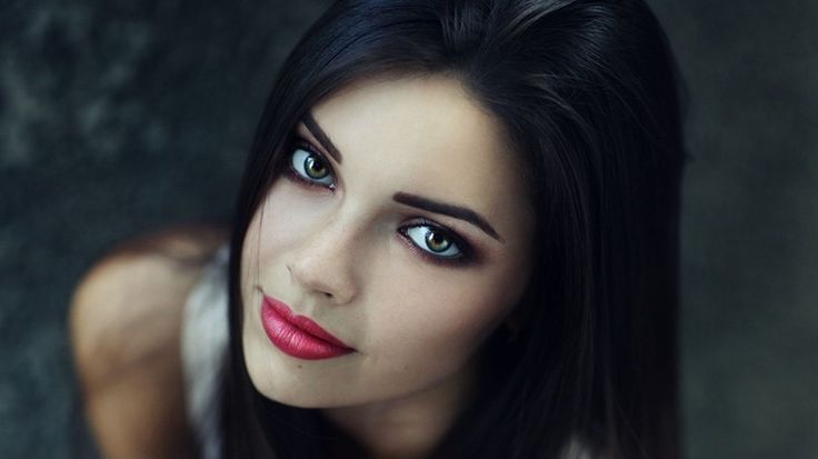 Beautiful girl with black hair green eyes