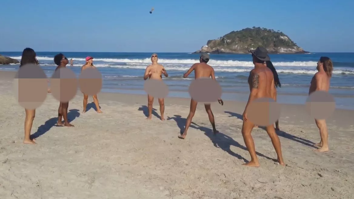 Teen playing nude on beach