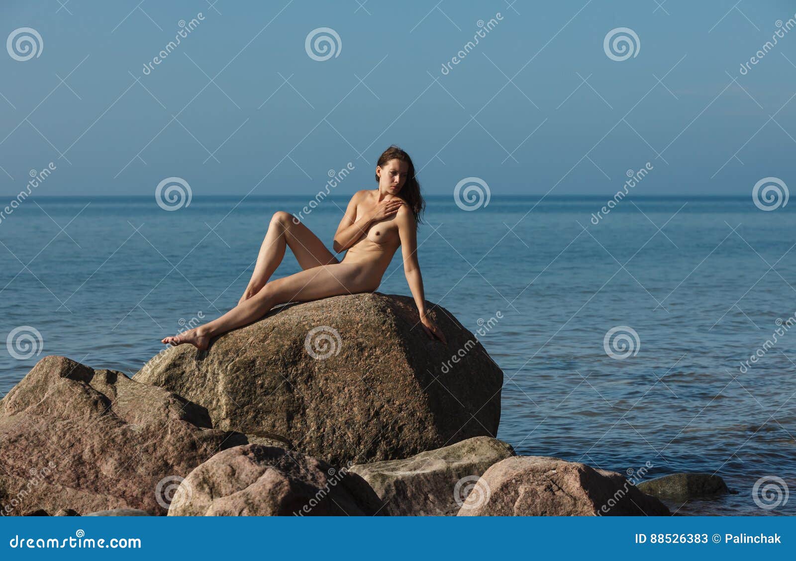 Cute girl naked in beach