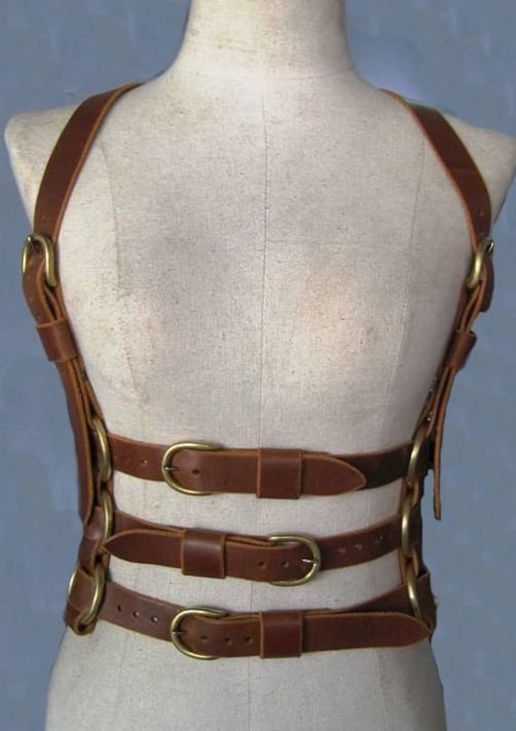 Hard leather corset bondage