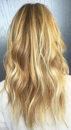 Golden honey blonde hair with highlights