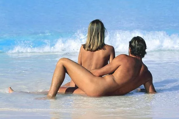 Women nude groups sunbathing