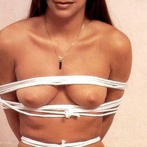 Ribbon tied bondage art